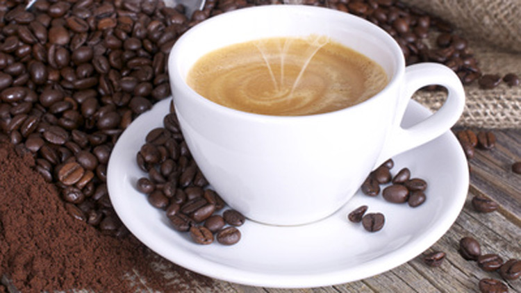 Tasse Kaffee und Bohnen, Copyright Fotolia.com